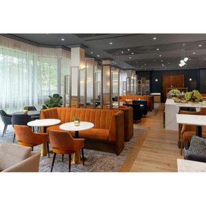 Light Luxury Orange Channel Tufted Banquette, Round Marble Tables & Upholstered Chairs