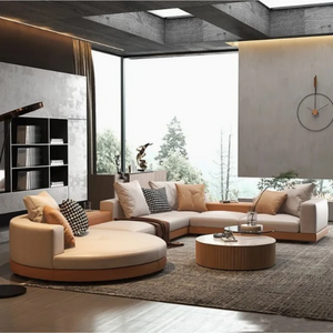 Contemporary Asymmetrical Modular Lounge Set With Reed‑Textured Round Coffee Table