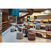 Vintage Ethnic B&B Lobby Lounge Custom Furnishings Curved Open Bookcases Hand-Woven Stools Integrated Fabric Cushion System